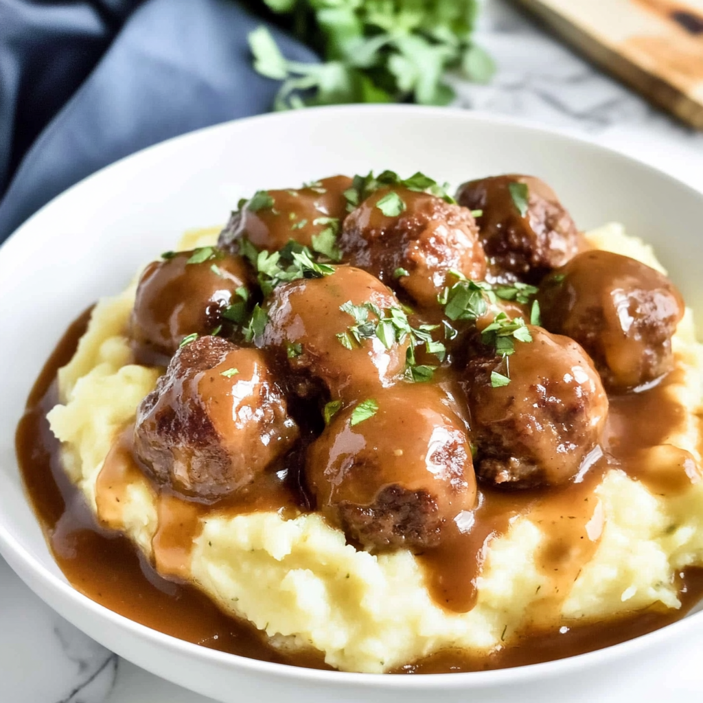 Recipe preparation for Salisbury Steak Meatballs with Garlic Herb Mashed Potatoes